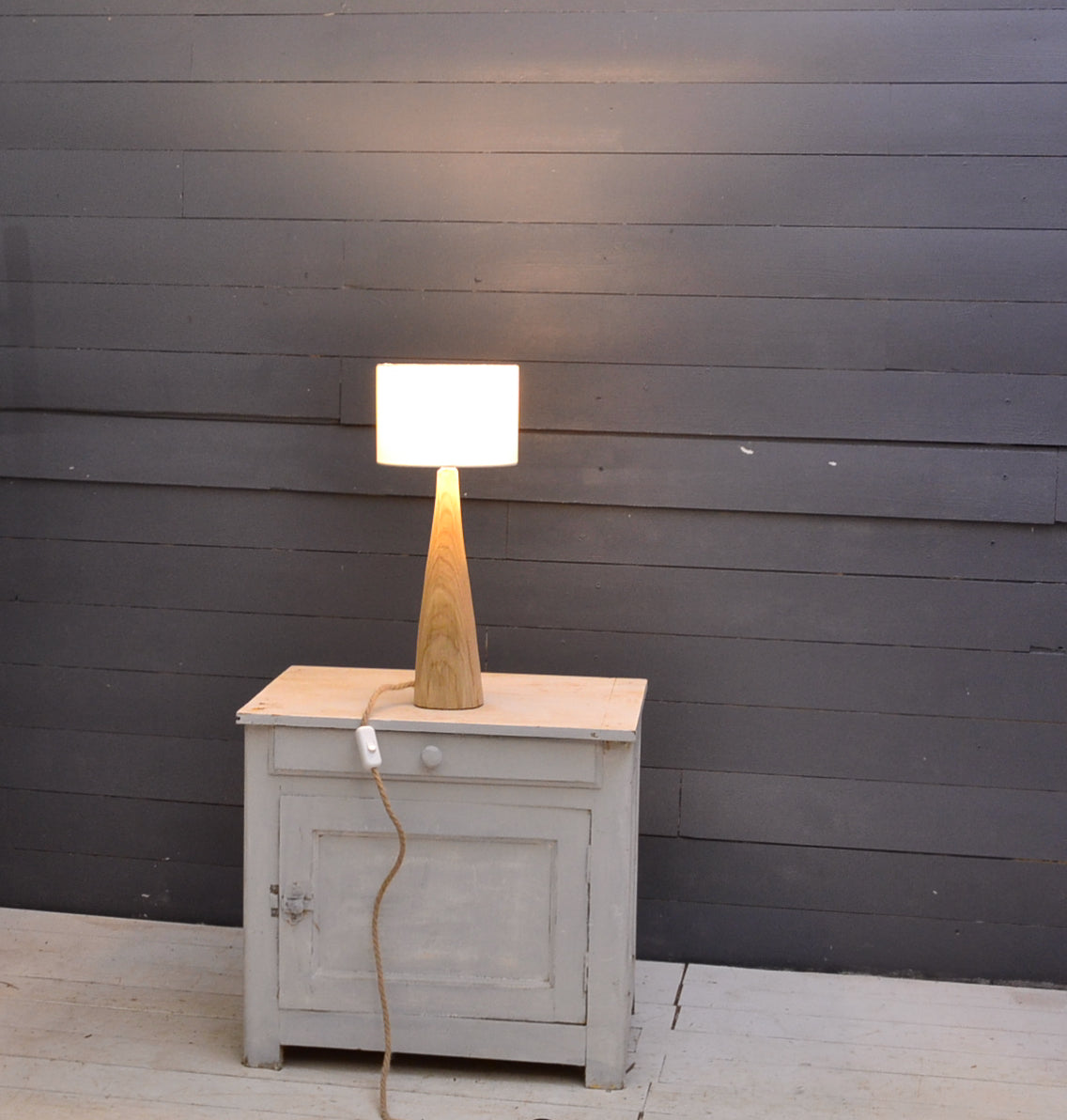 Table lamp in chestnut wood, conical shape