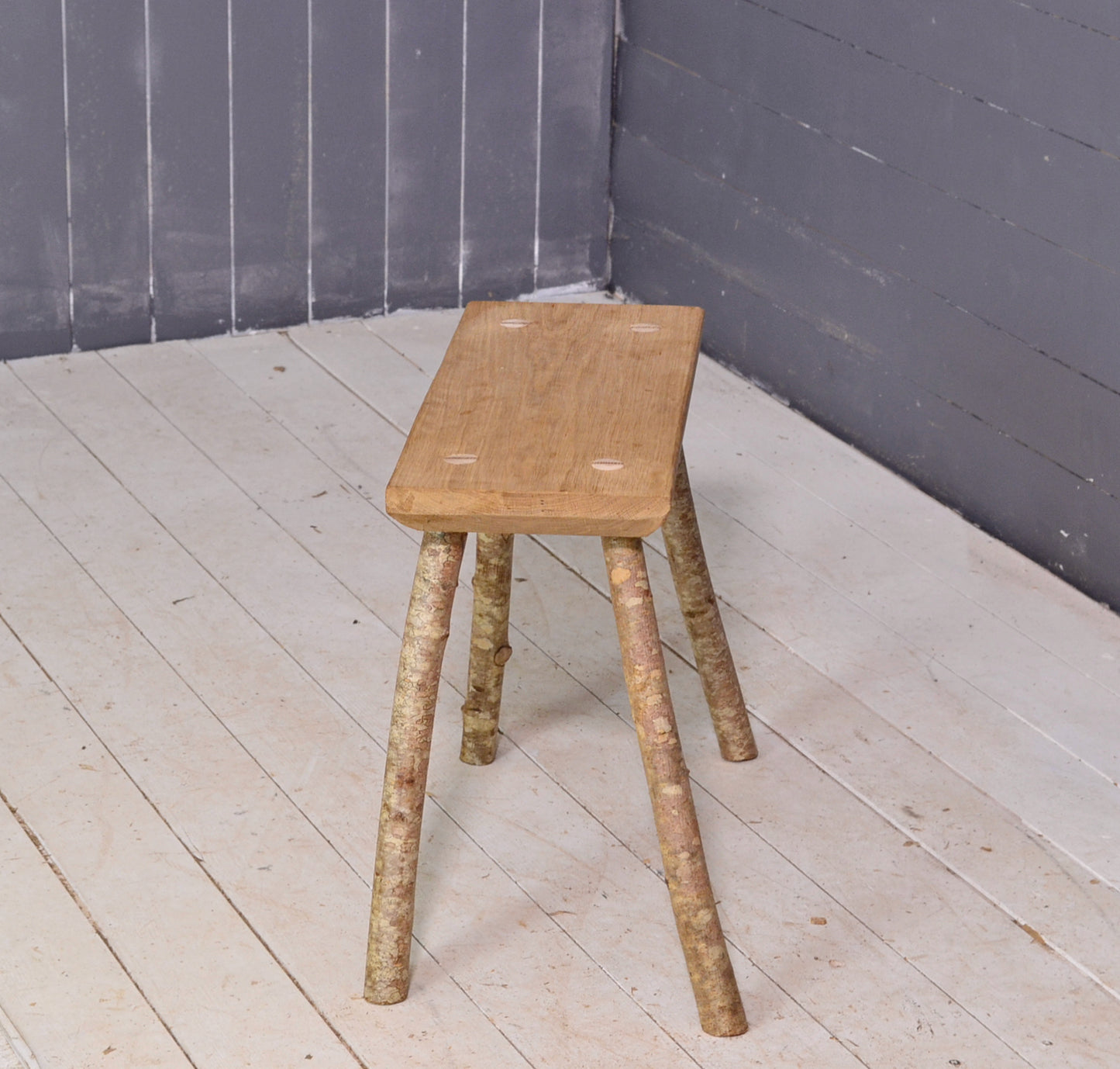 Wooden stool, oak, with hazel legs, end of sofa