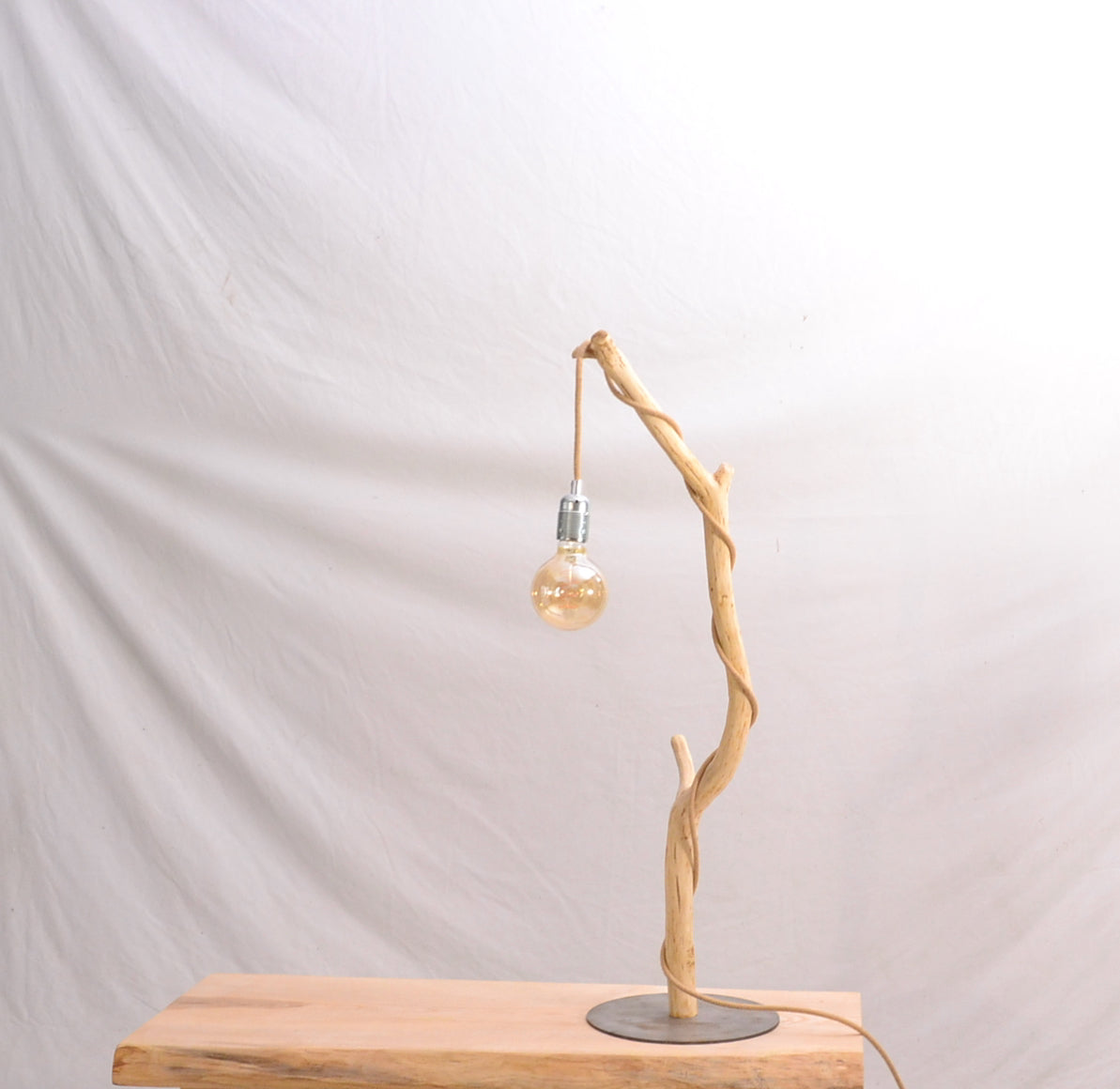 Wood table lamp with a beautiful oak branch, steel base