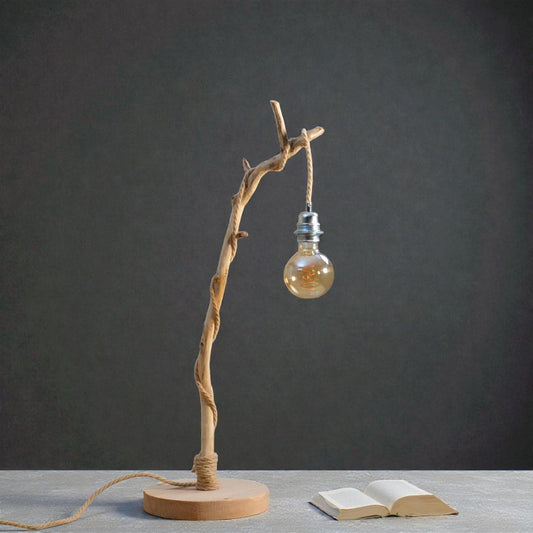Lampe de table avec une belle branche patinée par le temps
